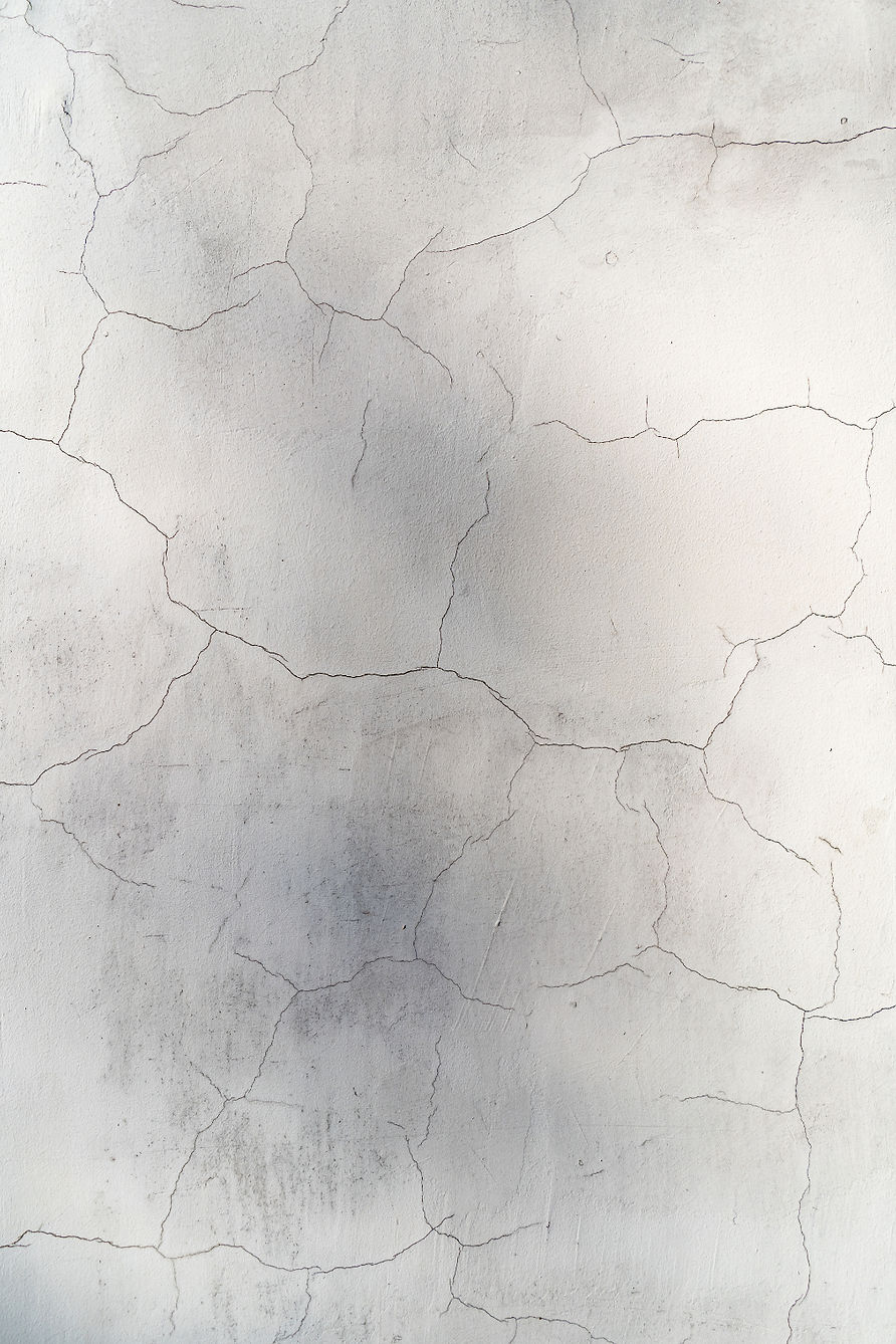 blank-cracked-concrete-wall-white-color-texture-background_edited.jpg
