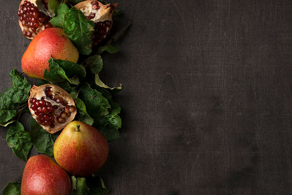 top-view-arrangement-delicious-pears-pomegranate-with-copy-space.jpg