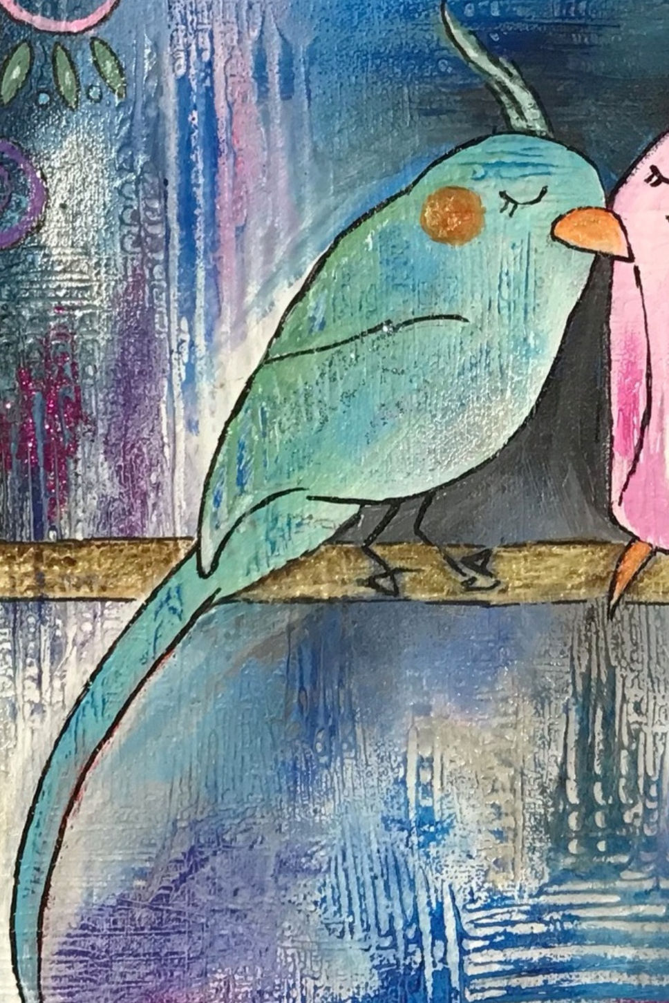 Thumbnail: Blue and pink cockatiels sitting together