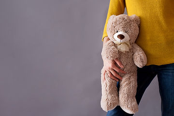 childholdingteddybear.jpeg