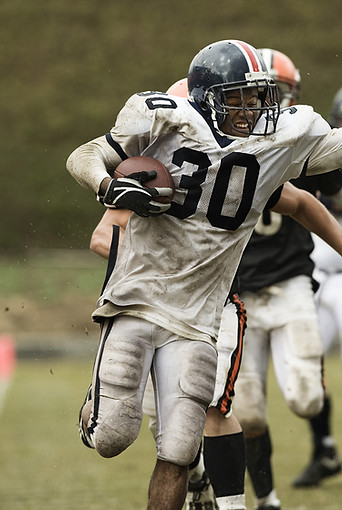 Running Back Carrying Ball