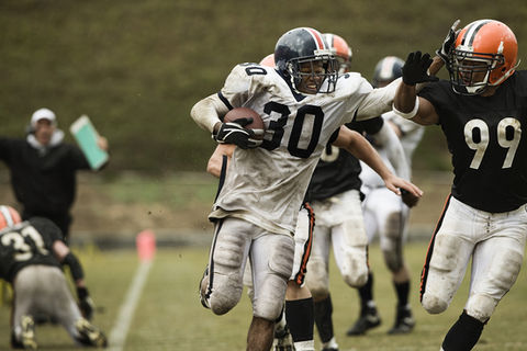 Running Back Carrying Ball