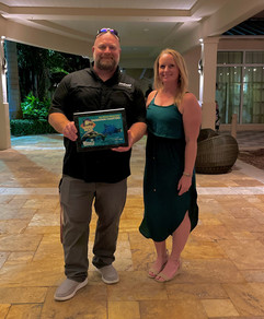 Winner of Best Offshore Fishing Charter with his plaque