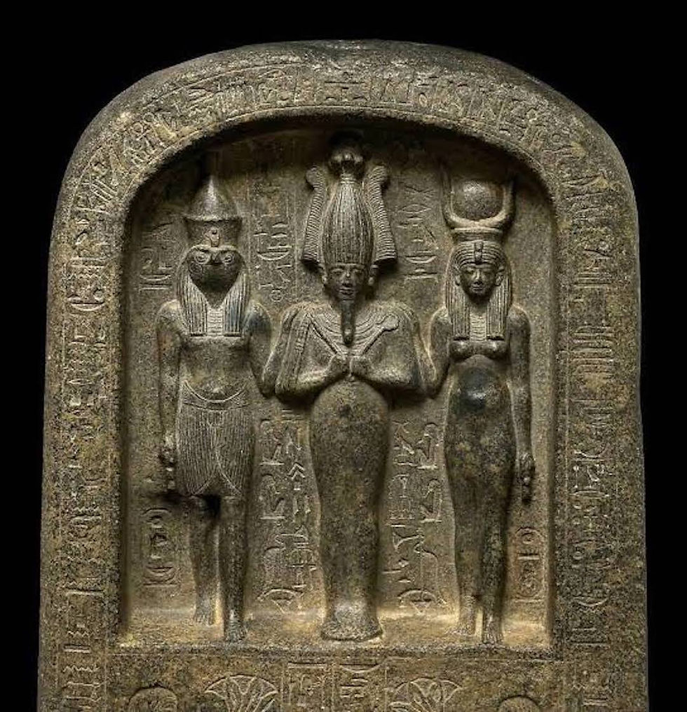 The first Holy Father, Mother, and Son in history, Heru, Asar, and Aset.