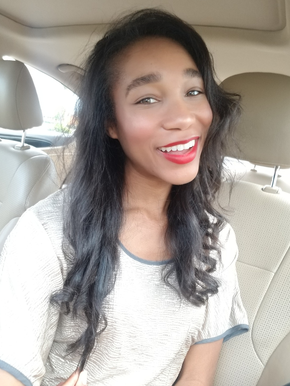 Kamla-Kay Natural hair straightened