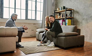 Couple participating in relationship counseling session focused on improving communication, rebuilding trust, and strengthening emotional connection.