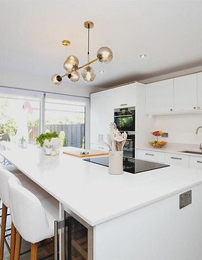 “Modern kitchen styling with bespoke furniture”