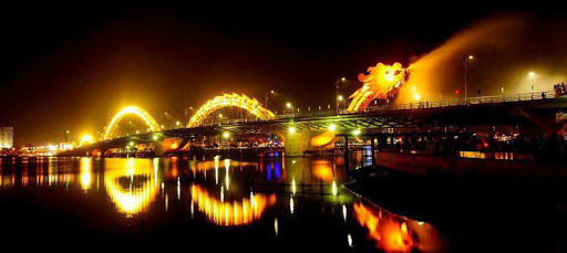 Night view of Dragon Bridge over the Han River with colorful lights