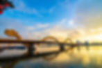 Dragon Bridge – a stunning golden dragon-shaped bridge spanning the Han River, famous for its fire and water shows at night.