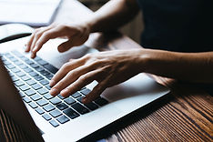 Hands on a keyboard. Built-in Cabinet Desk width: Allowing an open desktop space width of 60" provides enough space to "spread out".