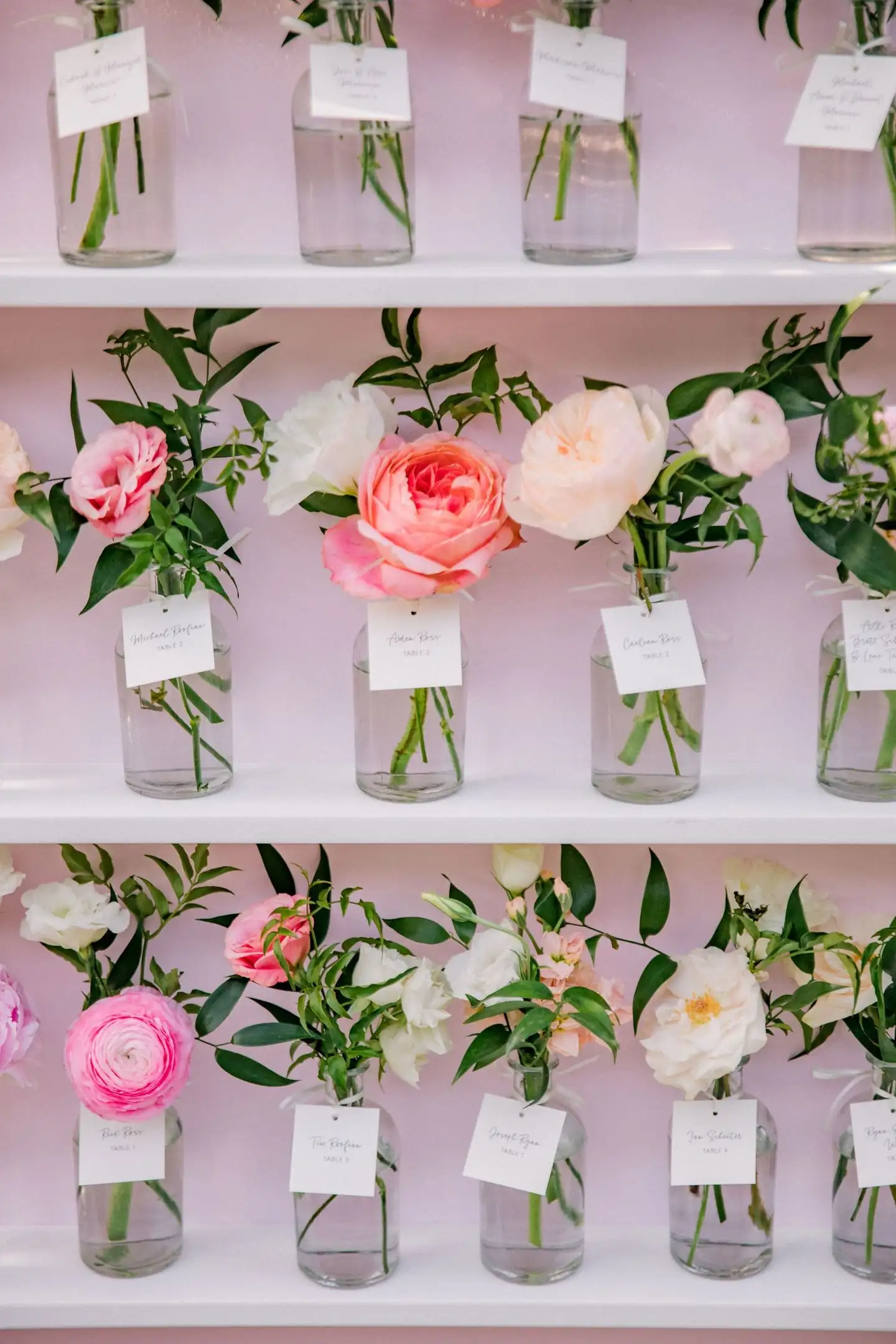 interactive wedding escort card display of bud vases