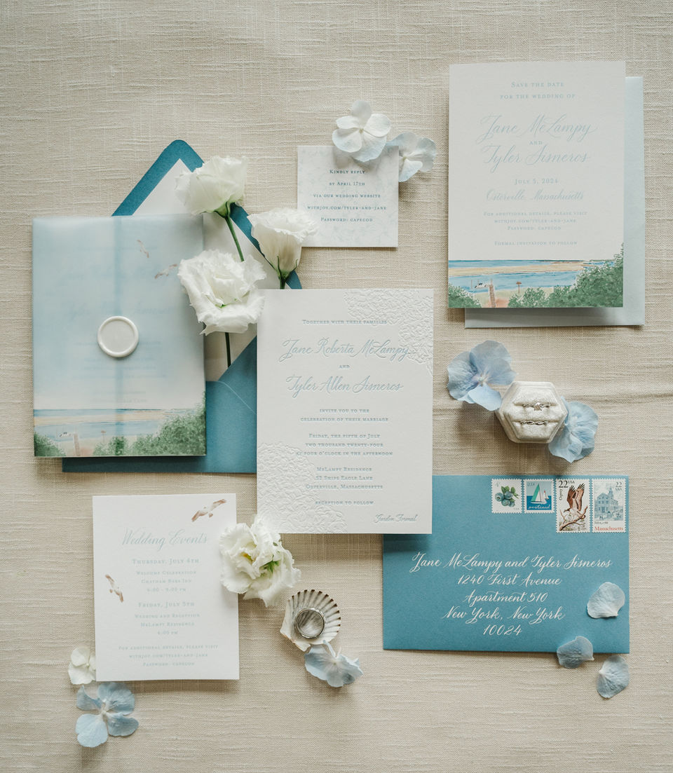 stationery flatlay featuring beautiful letterpressed wedding invitations