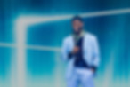 Kiangani-Bouya Ndombasi, Geschäftsführer der b.seen GmbH und Vorstand der Munich Fashion Week, als Keynote-Speaker und Model in München – High-End-Fashion trifft KI-Event-Marketing.