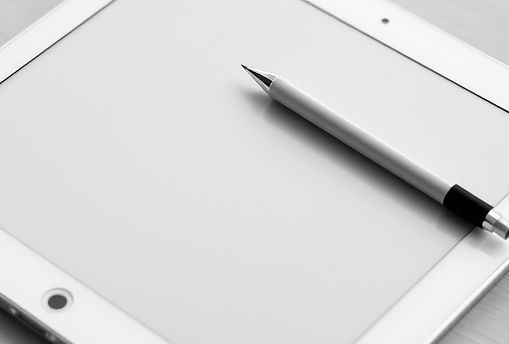 ipad and pen, vertical orientation, black and white.jpg
