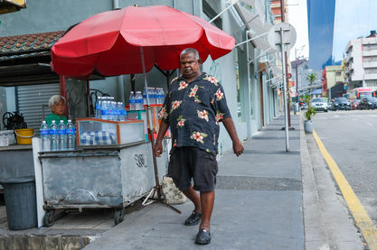 Man at Kuala Lumpur water stall