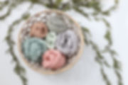 neutral color wraps for posed newborn photography in studio located in Conocord MA