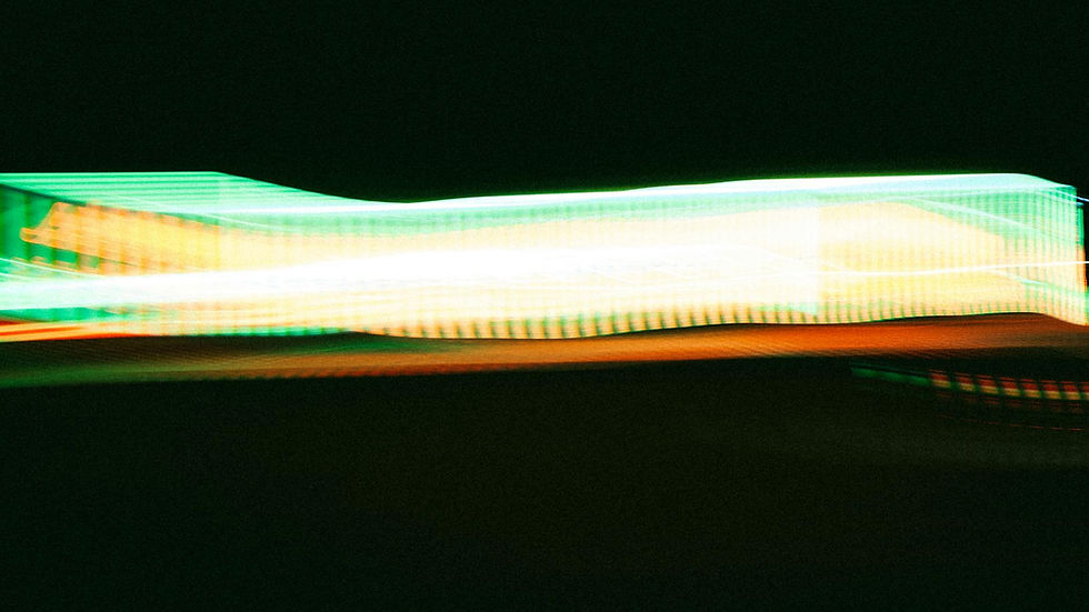 Vibrant abstract pattern of neon light trails creating dynamic energy.