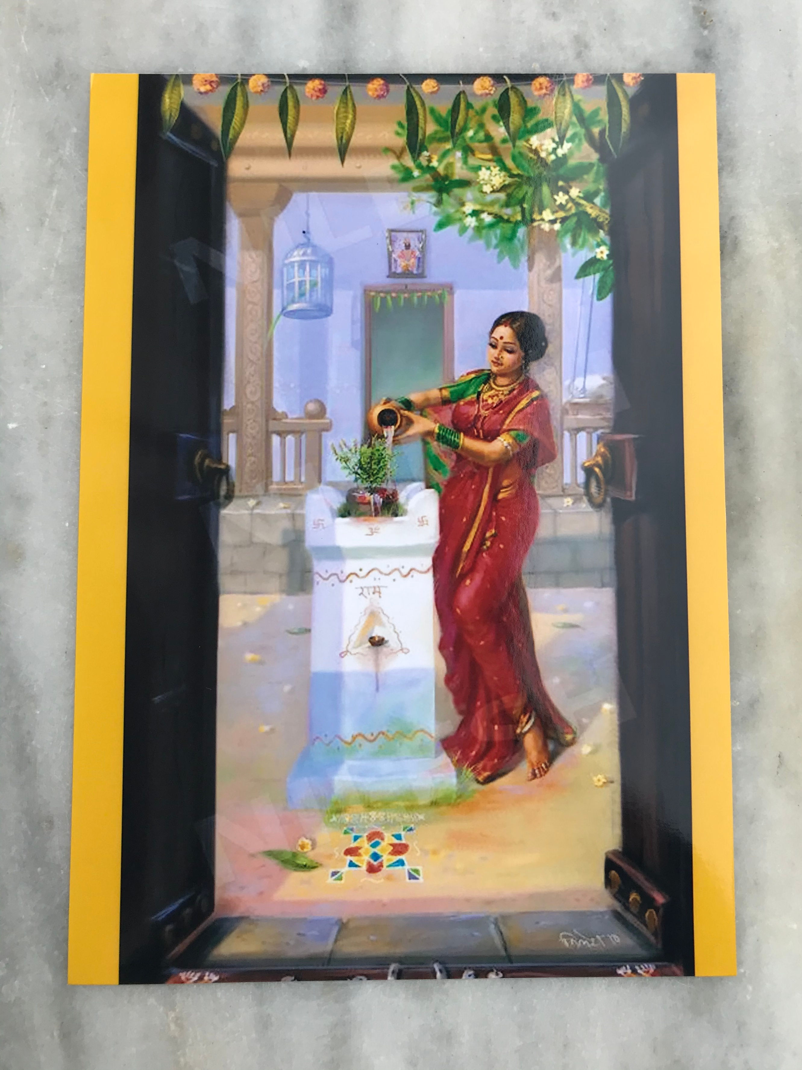 トゥラシーを崇拝する女性 / 写真