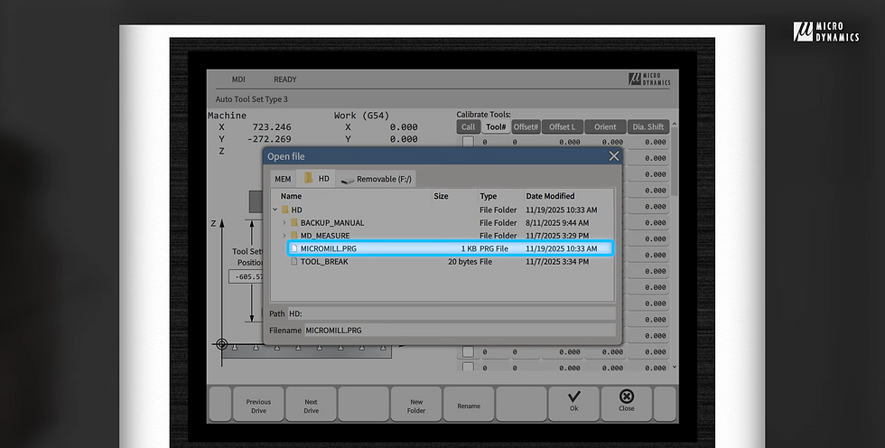 Press the "Tool" button on your keypad, press "Scan program" on your HMI screen, select the program and press "Ok" on Microdynamics cnc machine hmi