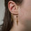Miniature : San, Manchette d'oreille
