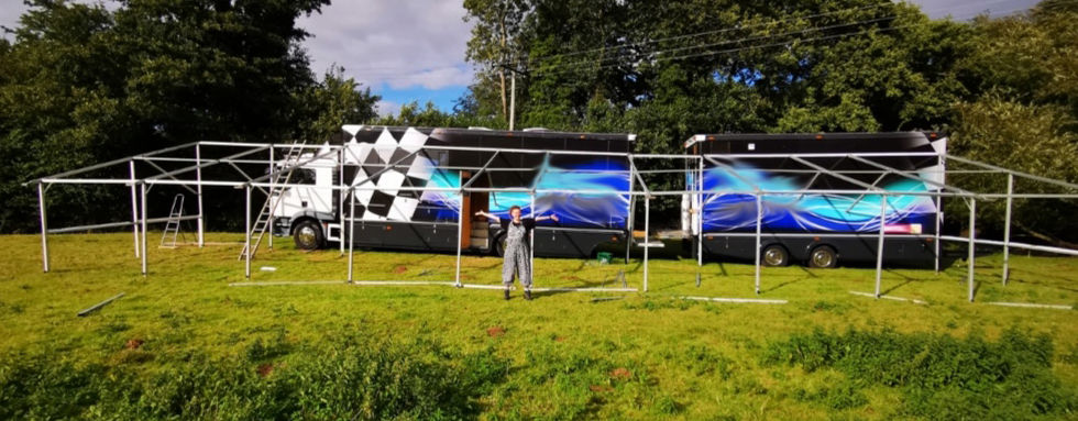 Our big truck & trailer with marquee poles attached