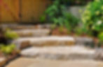 Huge natural stone slab steps create a beautiful landscape, and a transition to a hidden u