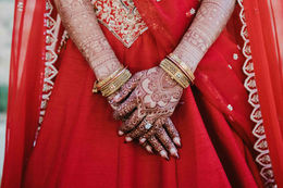 Indian wedding bride hands jewelry red dress Los Cabos Mexico
