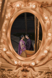 Indian wedding couple reflection portrait carousel Cancun Mexico