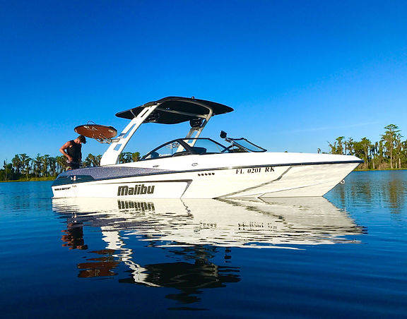 Wakesurf Orlando with our Tommy's Malibu 23 LSV Wakesetter Wakeboat