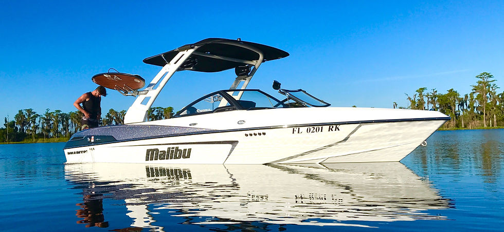 Wakesurf Orlando with our Tommy's Malibu 23 LSV Wakesetter Wakeboat