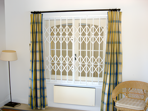 Grille repliable by Miroiterie Calabro