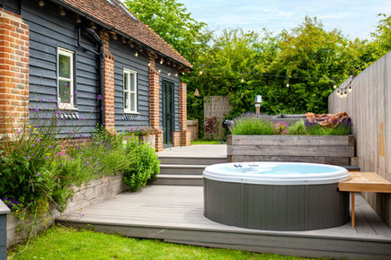 Garden of Silhouette's Stable holiday cottage with hot tub.