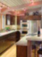 Opened to the great room, a more functional and inviting kitchen celebrates entertaining