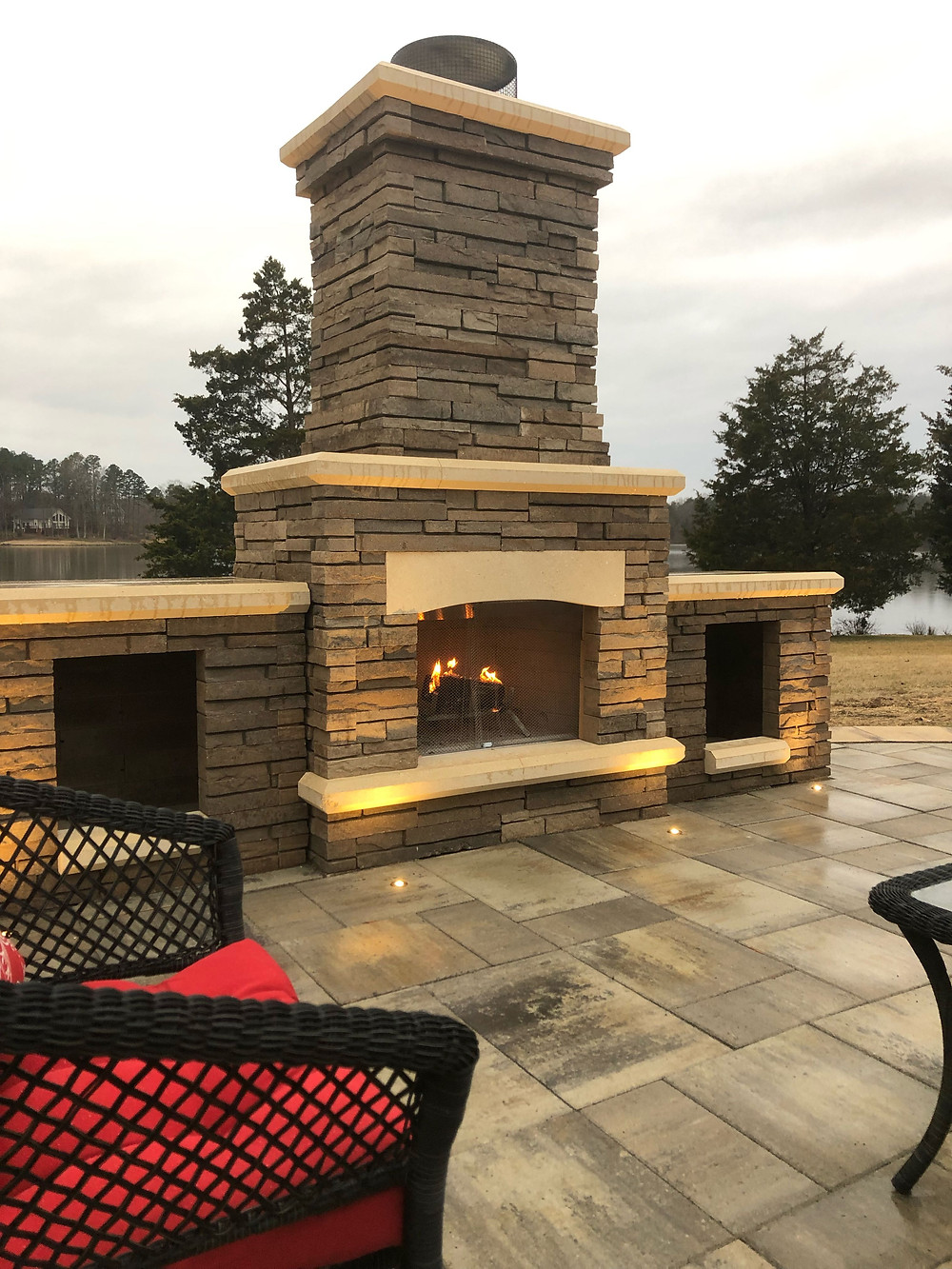 How Outdoor Lighting Can Accentuate Your Outdoor Fireplace This Summer in Vance County, NC
