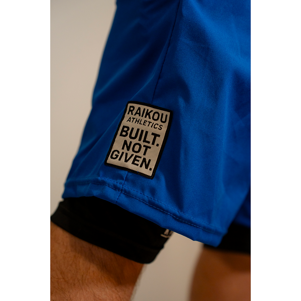 Miniatura: Pantaloncini 2 in 1 sportivi di colore blu con fodera interna a compressione nera