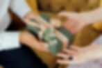 person-giving-gift-to-another.jpg