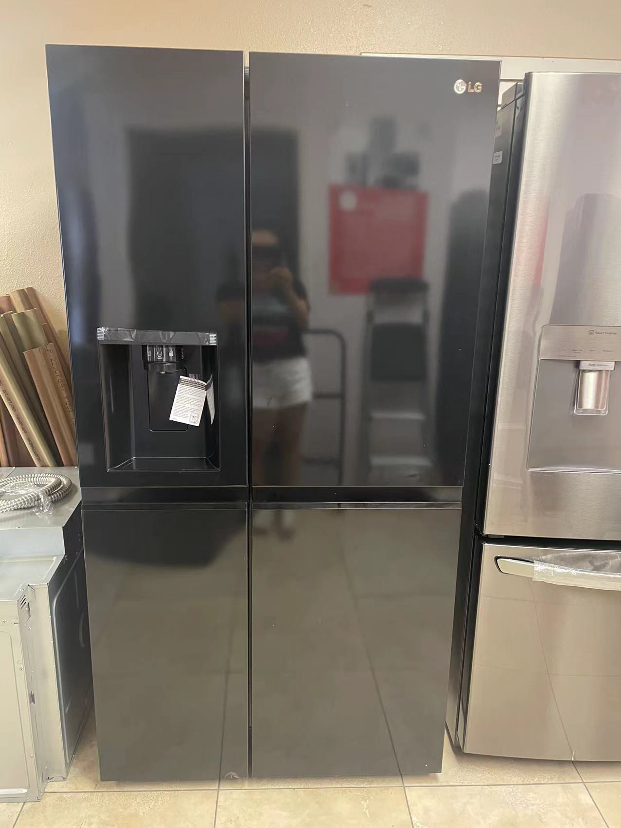27 cu. ft. Side-by-Side Refrigerator with Smooth Touch Ice Dispenser