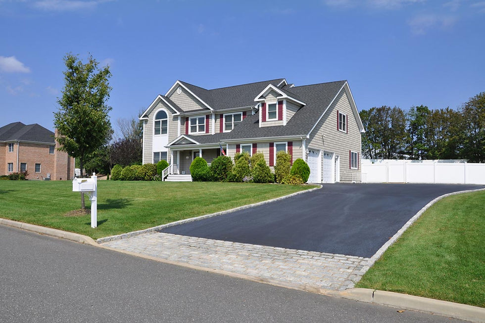 homeguide-surburban-home-new-asphalt-driveway-sealing.jpeg