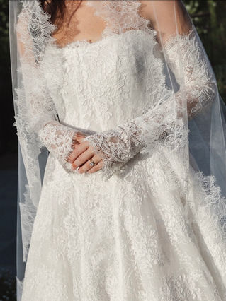 Real bride Lauren wears Lace Dahlia Bespoke Gown by Alena leena paired with Harper Lace Veil by Dove Grey