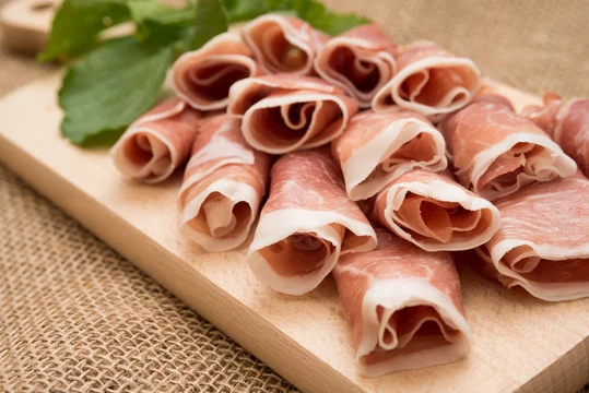 Prosciutto Crudo on a wooden board
