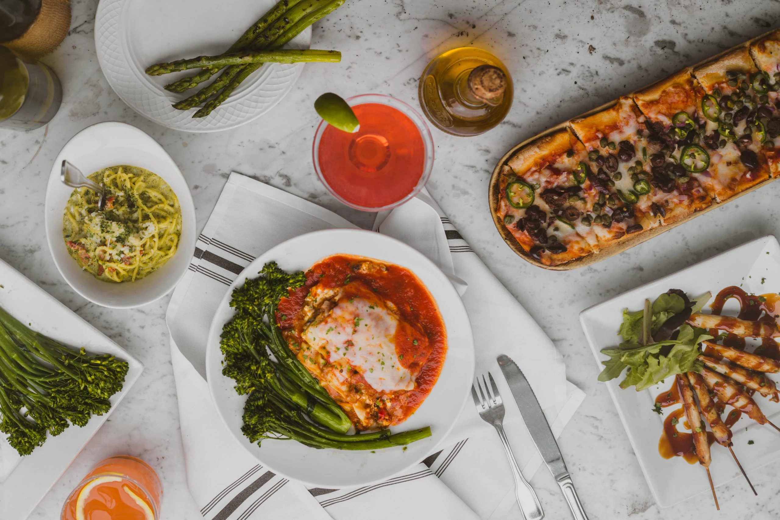Diverse Regional Specialty Italian dishes on a table.
