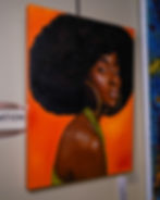 oil painting by Erica Rice of a Black woman with an afro set against an orange background