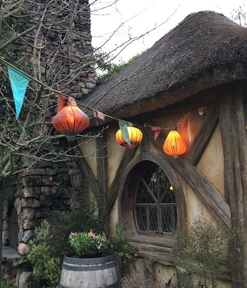 Orange and burgundy silk lanterns in Hobbiton Village in New Zealand