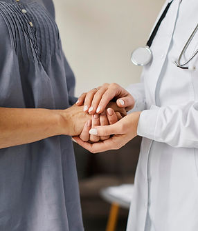 covid-recovery-center-female-doctor-holding-older-patient-s-hands.jpg