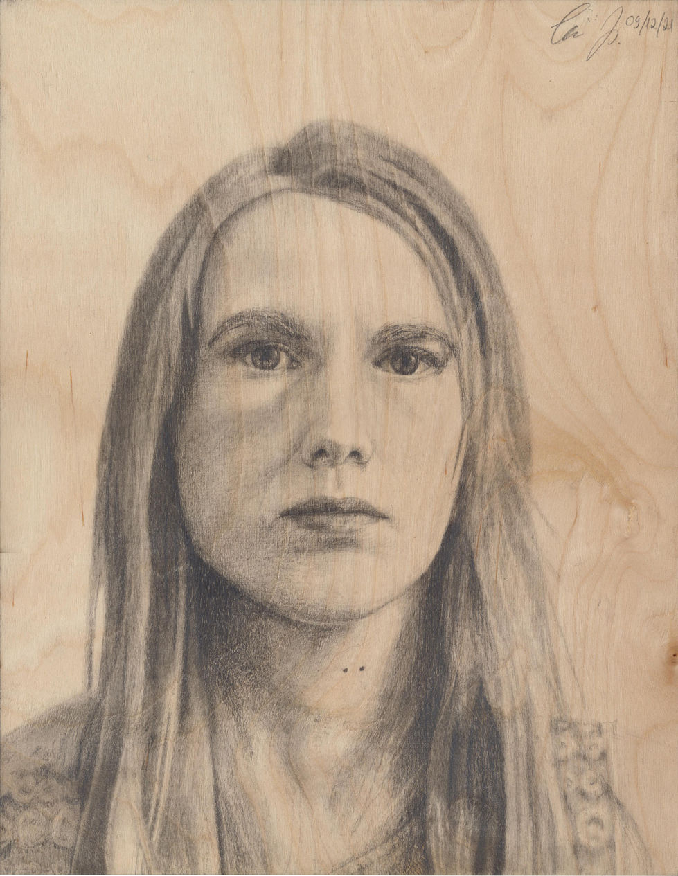 Self-portrait on wooden board