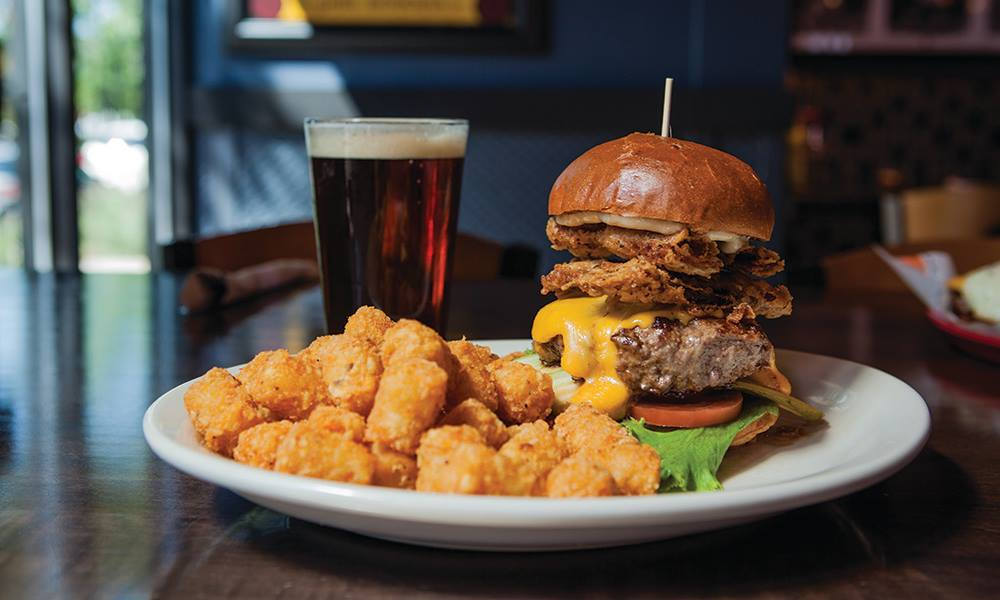 Bad Daddy's thick burger topped with buttermilk fried bacon