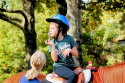 Hallie riding Shiloh