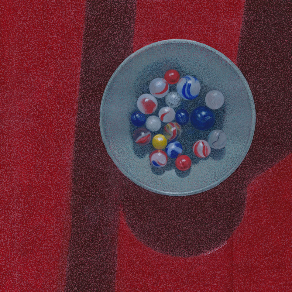 Marbles In A Stoneware Bowl On A Red Napkin