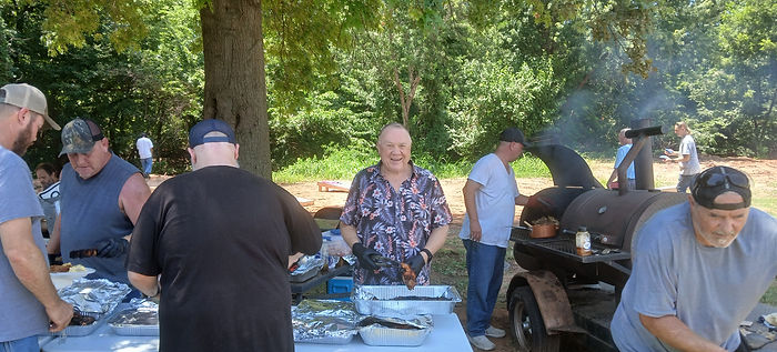 David helping servie and cook.jpg