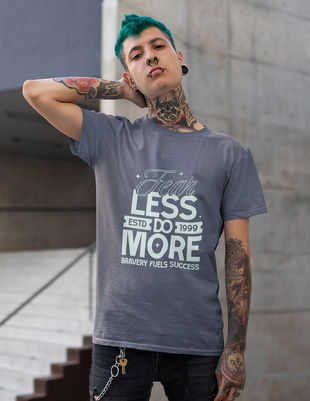 Handsome man wearing a blue positive energy t-shirt and blue flat bill cap